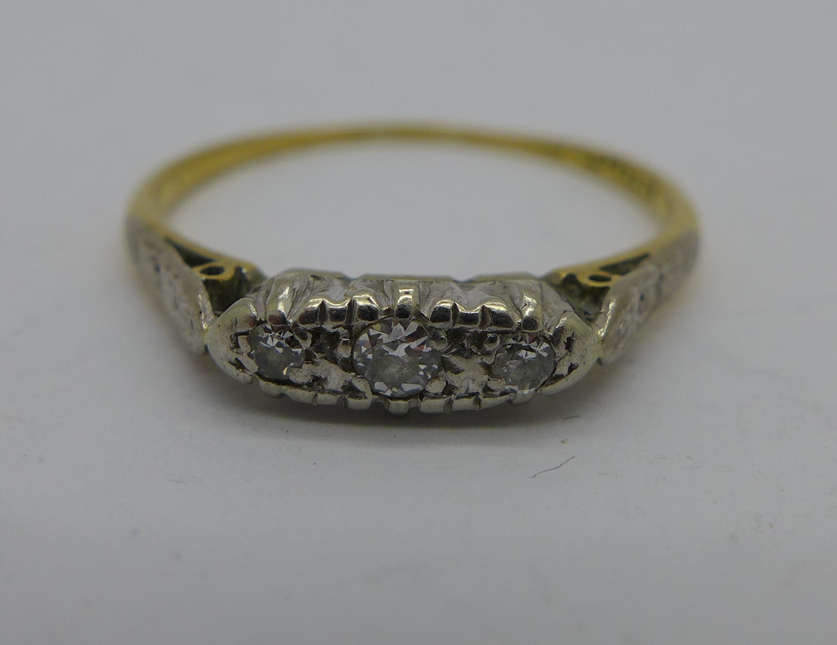 An 18ct gold and three stone diamond ring, 2. - Image 2 of 2