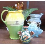 Four items of glass including a blue basket, a green Art Deco vase and two Carnival vases,