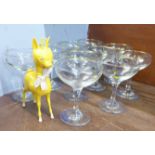 Ten Babycham glasses and a Babycham fawn figure (one glass with white fawn)