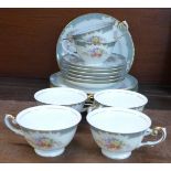 Six tea cups with saucers and six desert plates,