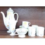 A Royal Doulton coffee service, six saucers, four cups, two a/f, coffee pot,