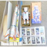 A tin-plate rocket, boxed,