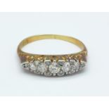An 18ct gold and five stone diamond ring, 2.