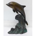 A bronze dolphin,