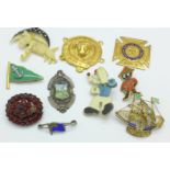 Assorted brooches and badges and a silver and enamel football medal for N.W.