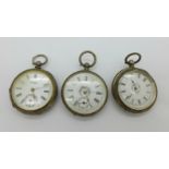 Three silver cased fob watches,