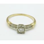 A yellow and white metal diamond set Art Deco ring, marked 14k, 1.