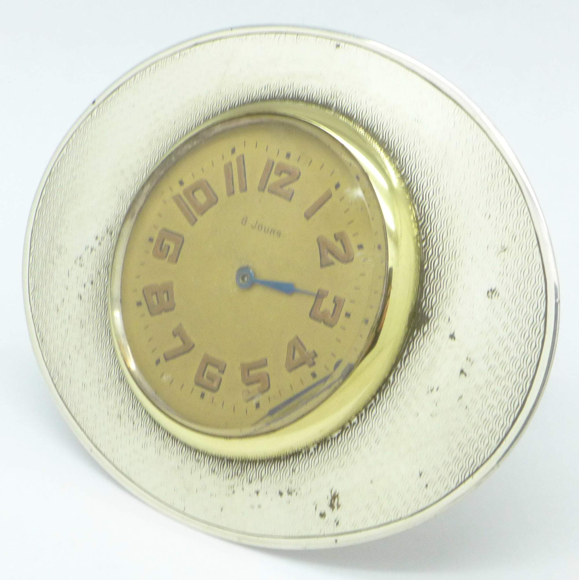 A silver mounted 8-day clock, Adie Bros.