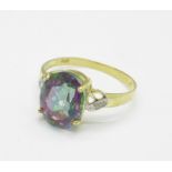 A 9ct gold, mystic topaz and diamond ring, 1.