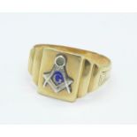 A yellow metal Masonic ring, marked 10k, mark worn, 2.