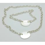 A silver necklace and bracelet, 47.