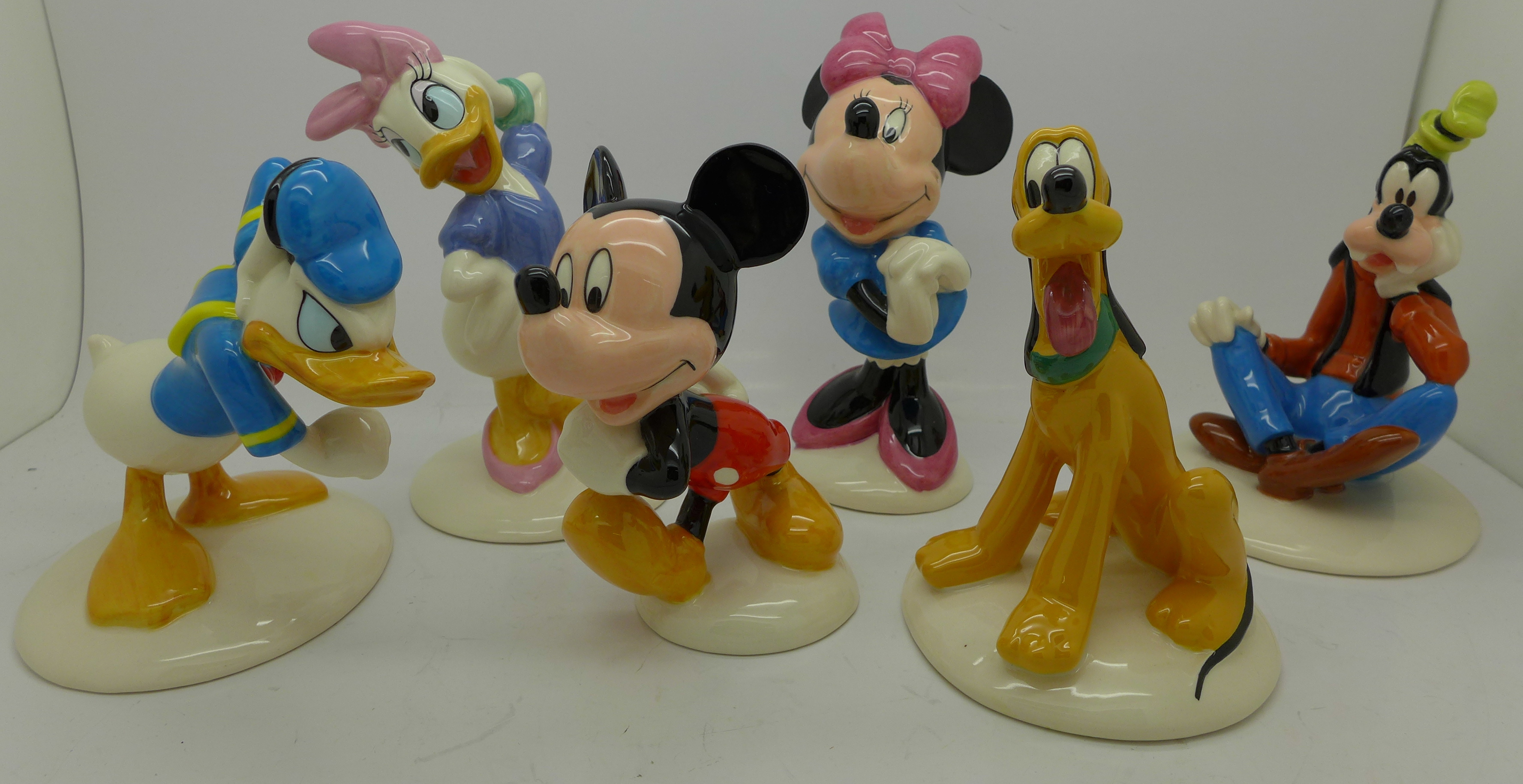 Six Royal Doulton Mickey Mouse Collection figures, Celebrating 70 Years of Mickey Mouse,