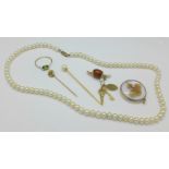 A cultured pearl necklace with 9ct gold fastener,