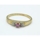 A 9ct gold, diamond and ruby ring, 1.