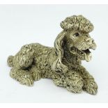 A white metal coated model poodle