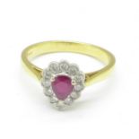 An 18ct gold, diamond and ruby ring, 3.