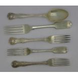 Four Victorian silver forks and a spoon,