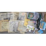 A collection of ephemera including ration books, postcards, stamps, etc.