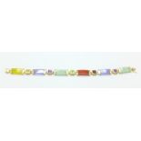 A 14ct gold and multi stone and gem set bracelet, total weight 11.