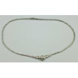 An 18ct white gold and diamond set necklace, 18.