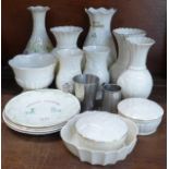 Fifteen Belleek vases and plates and two Irish pewter cups,