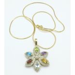 A 9ct gold and semi-precious stone set pendant on a fine 9ct gold chain, 7.