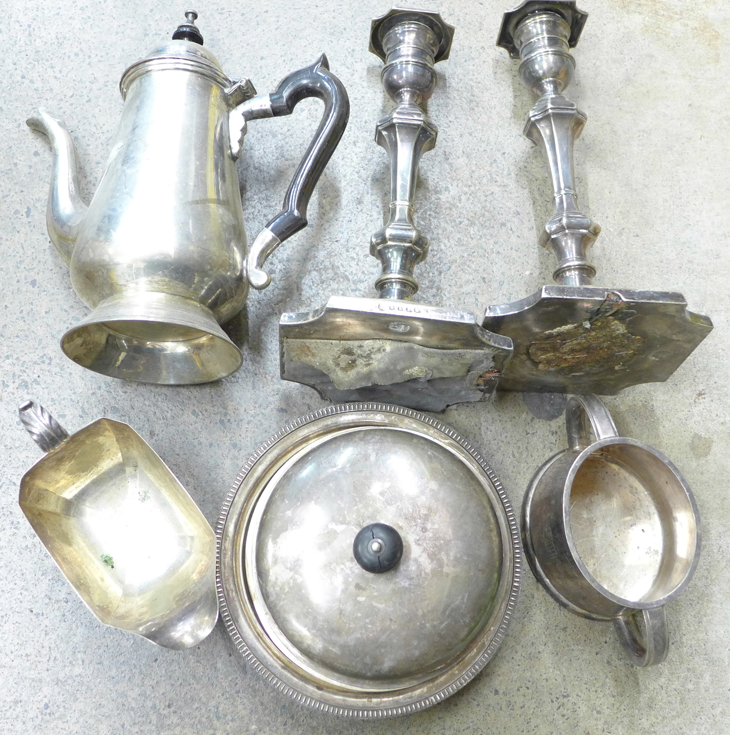 A pair of plated candlesticks, muffin dish, coffee pot, etc.