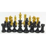 A chess set, boxed, height of king 73mm,
