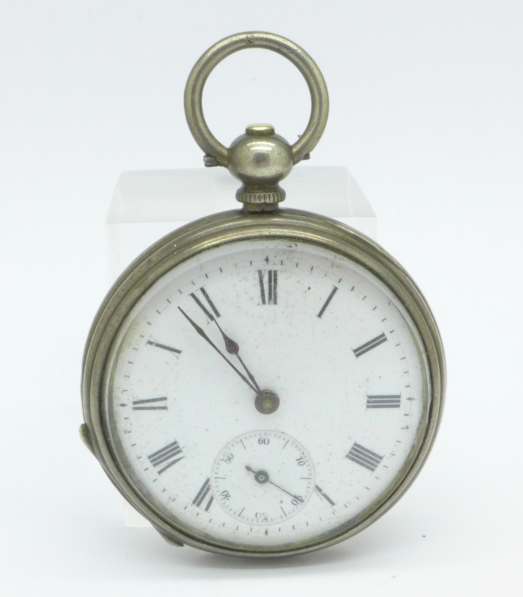 A silver fob watch