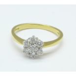 An 18ct gold and diamond cluster ring, 2.