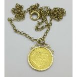 A Victorian 1897 half sovereign in a 9ct gold mount on a 9ct gold chain, total weight 11.