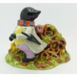 A Royal Doulton The Wind in The Willows figure, Every Hole Possessed A Face,
