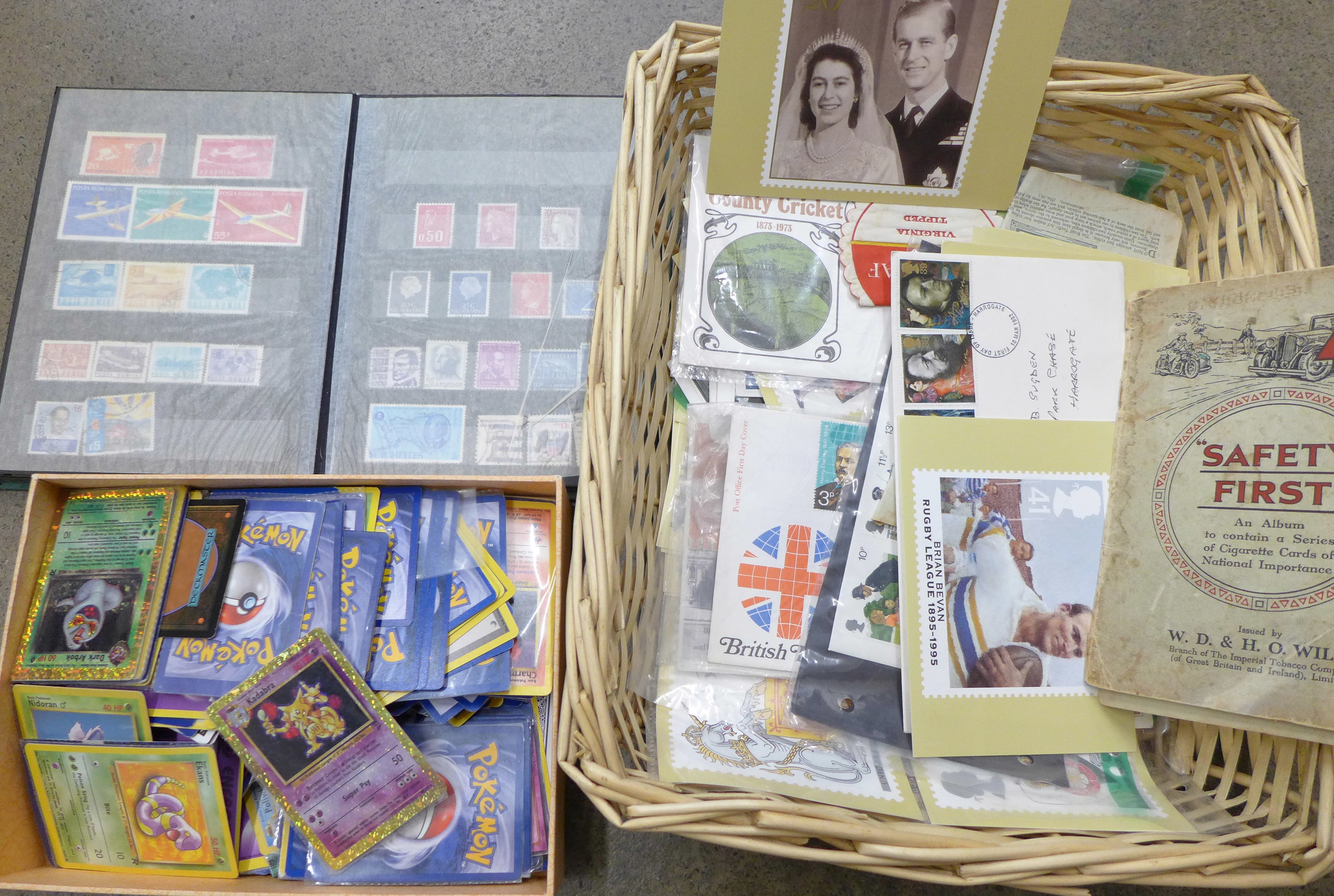 A collection of first edition Pokemon cards, an album of stamps and Wills cigarette cards, etc.