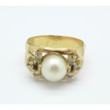 A yellow metal, pearl and white stone ring (tests as 18ct gold), 4.