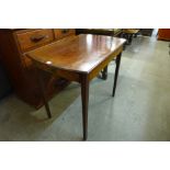 An Edward VII mahogany single drawer table
