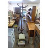 A bentwood coat stand and two footstools