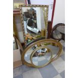 Two gilt framed mirrors and an oval mirror