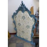 A rococo style carved wood mirror frame