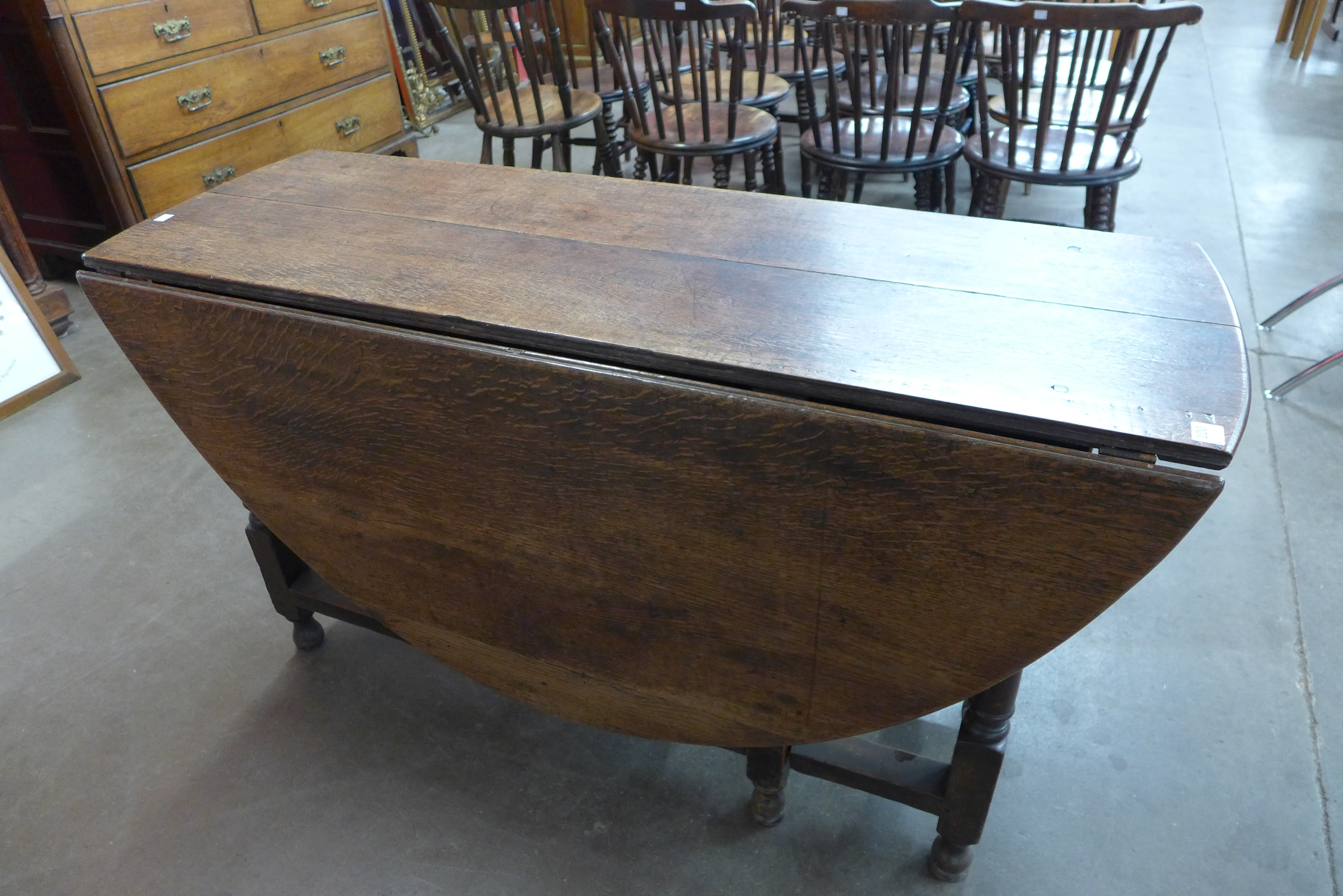 A George III oak gateleg dining table