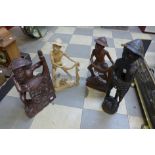 Four carved wooden figures