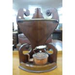 A walnut corner stick stand and copper kettle