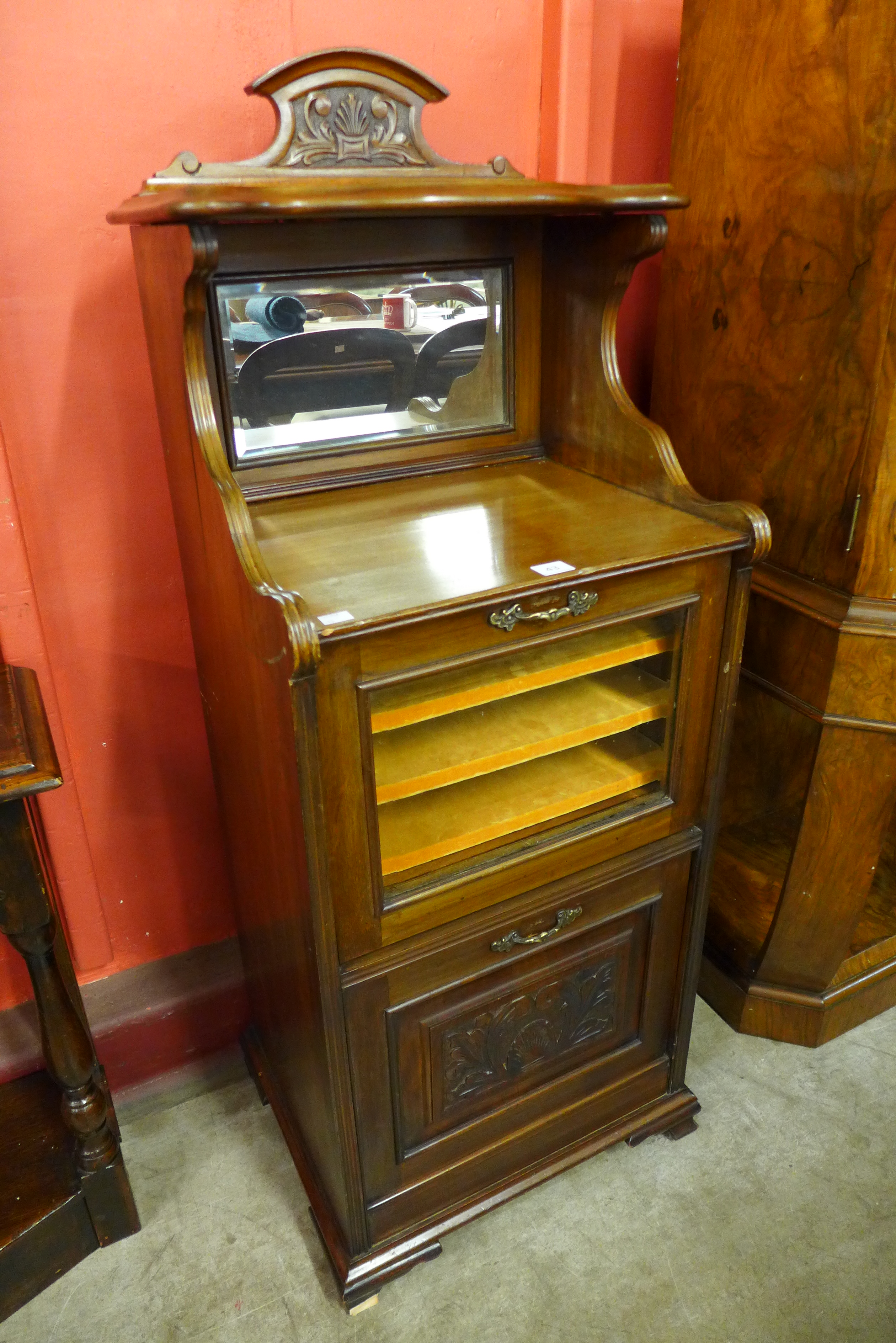 A Victorian walnut music cabinet
