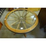 An elm ship's wheel coffee table