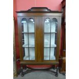 An Edward VII inlaid mahogany display cabinet