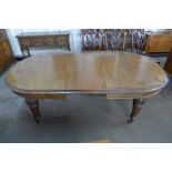 A Victorian mahogany extending dining table