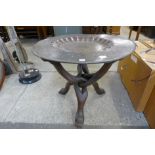 An Islamic metal topped occasional table