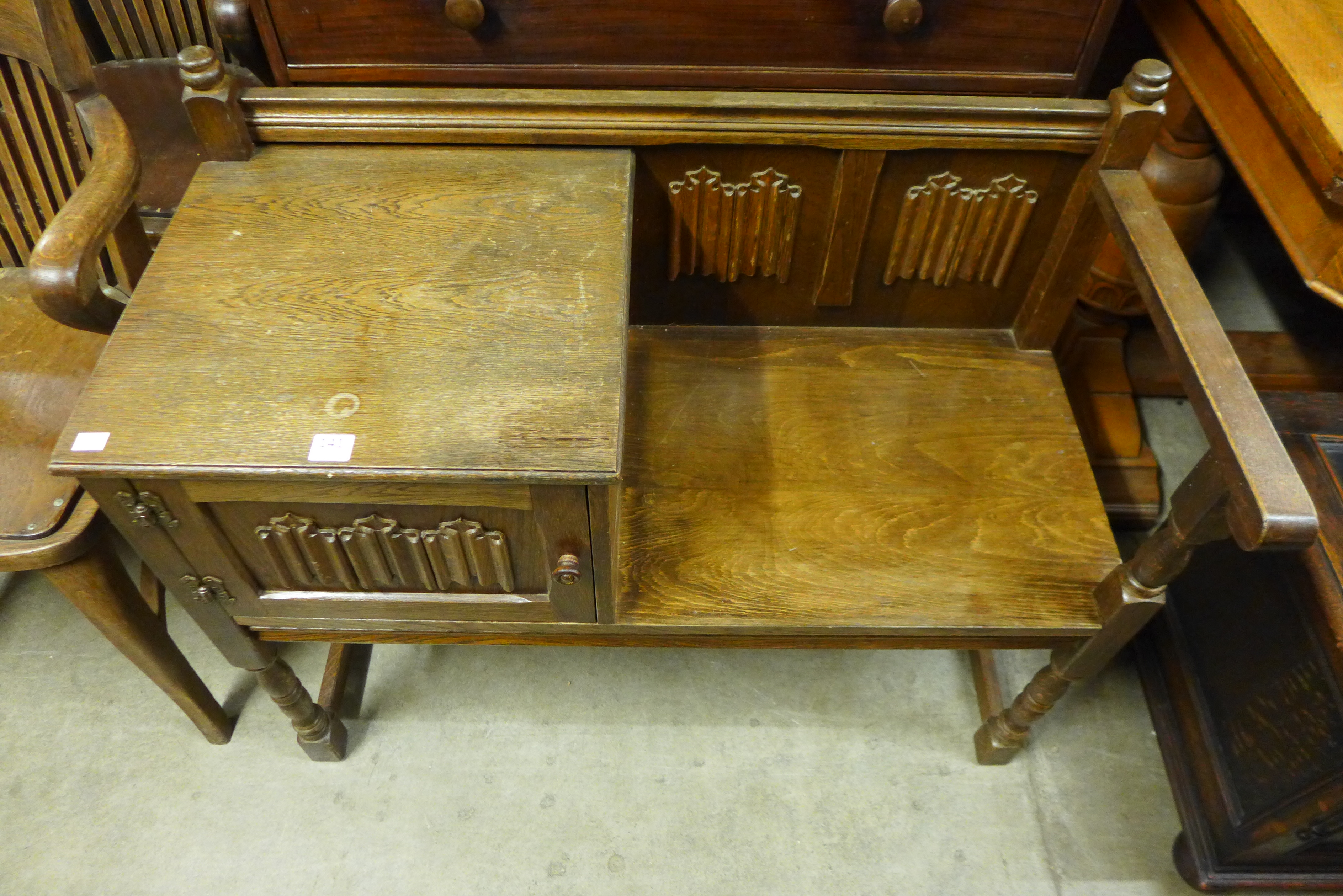 An oak telephone table