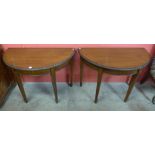 A pair of Edward VII mahogany demi lune console tables