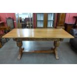 A carved oak refectory table