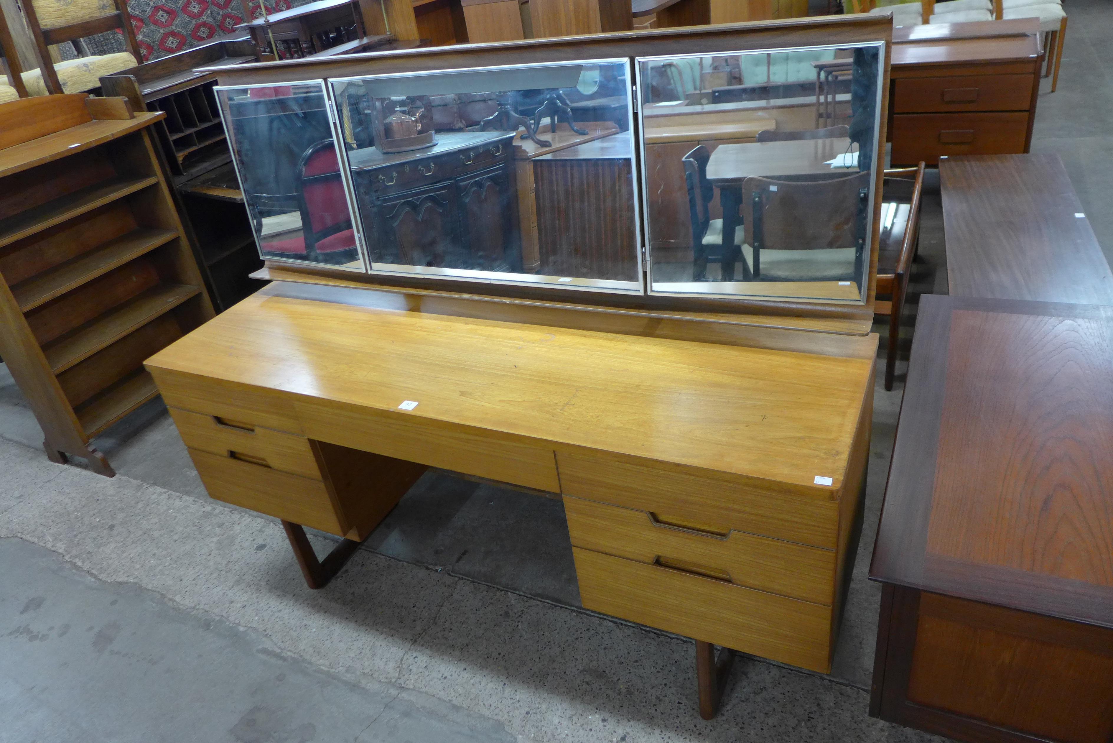 A teak dressing table